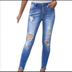102. High Waist, Distressed, button fly jeans