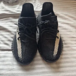 adidas Black and White Athletic Shoes