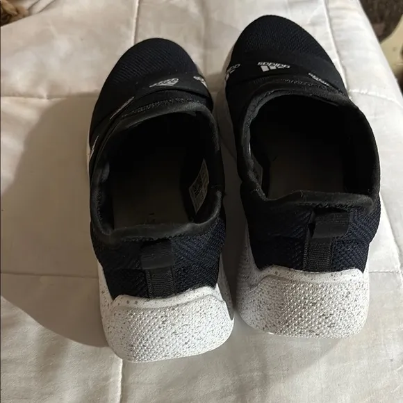 Adidas Black and White Slip-On Sneakers
