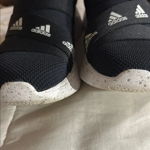 Adidas Black and White Slip-On Sneakers