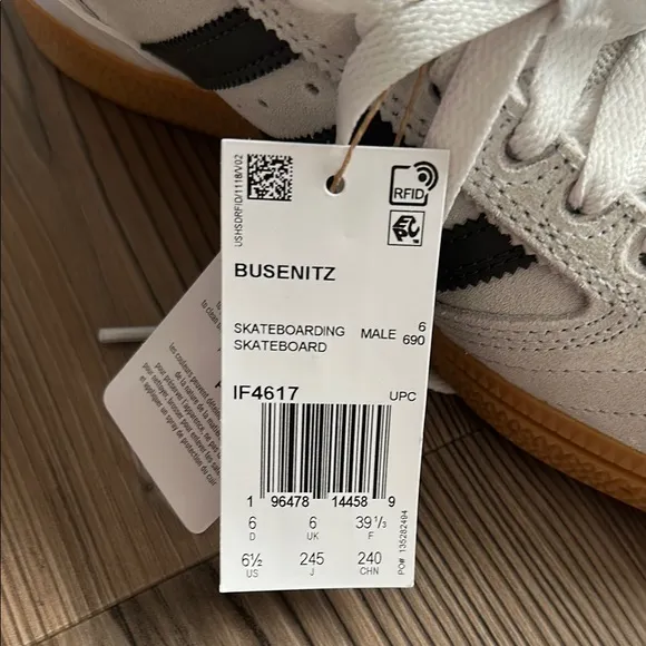 Adidas Men’s White and Black Sneakers