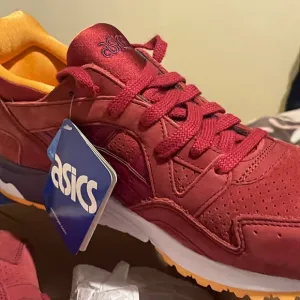 Asics Red and Orange Athletic Shoes