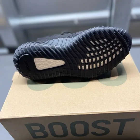 Black and Red Yeezy Boost Sneakers with Ribbed Sole