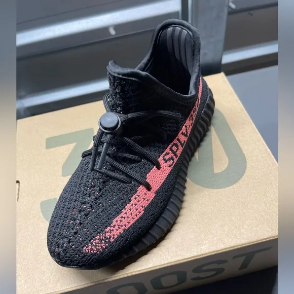 Black and Red Yeezy Boost Sneakers with Ribbed Sole