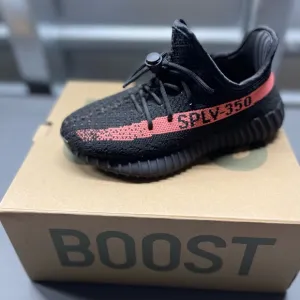 Black and Red Yeezy Boost Sneakers with Ribbed Sole