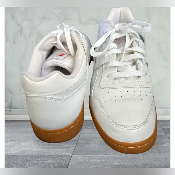 Classic REEBOK Men's Sneaker, Size 10, White With Rubber Sole.