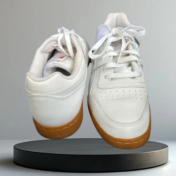 Classic REEBOK Men's Sneaker, Size 10, White With Rubber Sole.