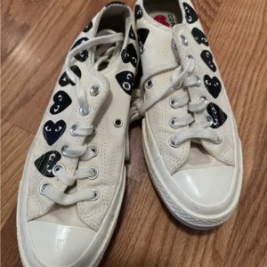 Converse Cream and Black Heart Sneakers