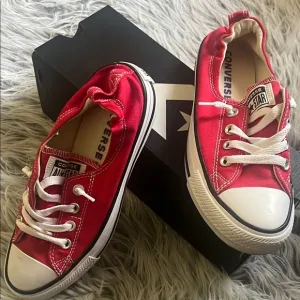 Converse Red Canvas Sneakers with White Laces and Rubber Toe Cap