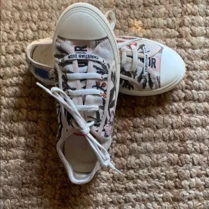 Dior White Canvas Sneakers with Playful Doodles