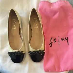 FRENCH SOLE BRAIDED FRONT DESIGN, FLATS ARE CREAM AND BLACK.   NEW IN BOX