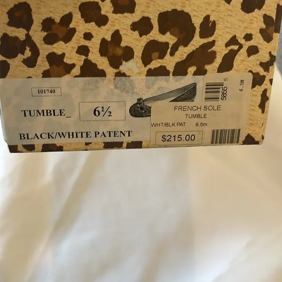 FRENCH SOLE BRAIDED FRONT DESIGN, FLATS ARE CREAM AND BLACK.   NEW IN BOX