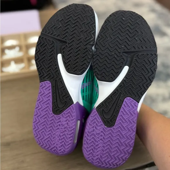 Green and Purple Athletic Shoes with Pink Accents