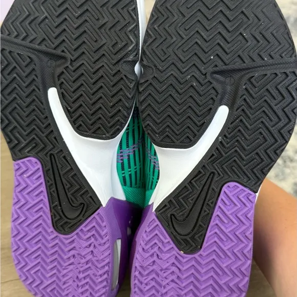 Green and Purple Athletic Shoes with Pink Accents