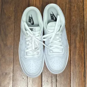 Ladies nike dunk low triple white monochromatic leather construction sneakers