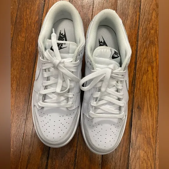 Ladies nike dunk low triple white monochromatic leather construction sneakers