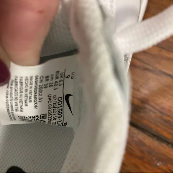 Ladies nike dunk low triple white monochromatic leather construction sneakers
