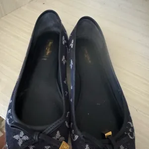 Louis Vuitton Black Flats with Bow Detail