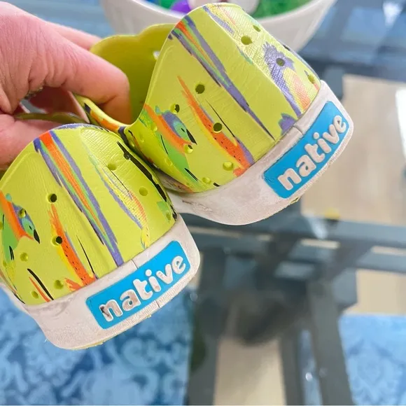 Native Yellow Sneakers with Vibrant Sole and Traction Pattern