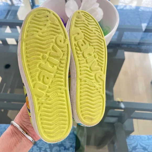Native Yellow Sneakers with Vibrant Sole and Traction Pattern