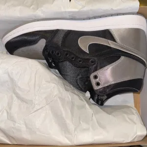 Nike Black and Silver High-Top Athletic Shoes
