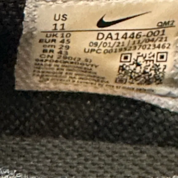 Nike Black and White Sneakers with Thick Sole and Canvas Upper