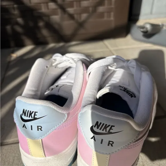 Nike White and Blue Athletic Shoes with Classic Design