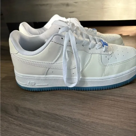 Nike White and Blue Athletic Shoes with Classic Design