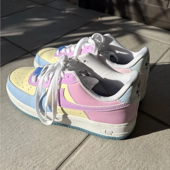 Nike White and Blue Athletic Shoes with Classic Design