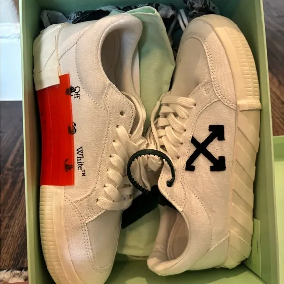 Off-White White Sneakers with Black Arrow Design