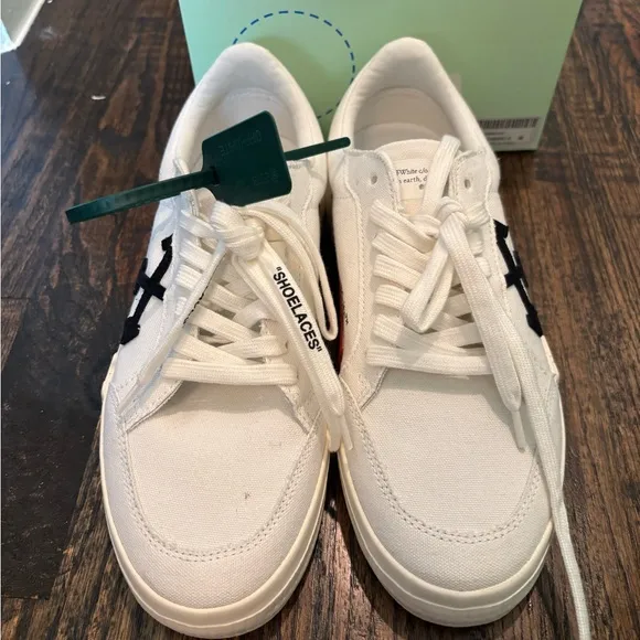 Off-White White Sneakers with Black Arrow Design