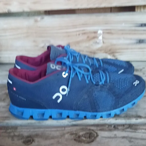 On Running Blue and Red Athletic Shoes with CloudTec Sole