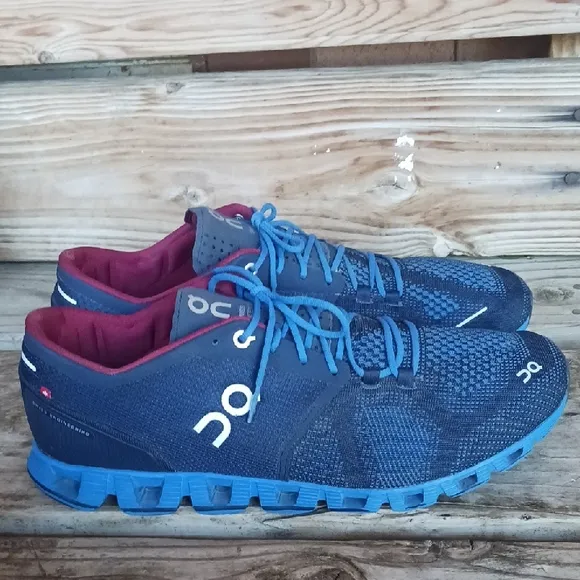 On Running Blue and Red Athletic Shoes with CloudTec Sole