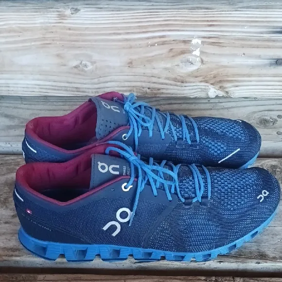 On Running Blue and Red Athletic Shoes with CloudTec Sole