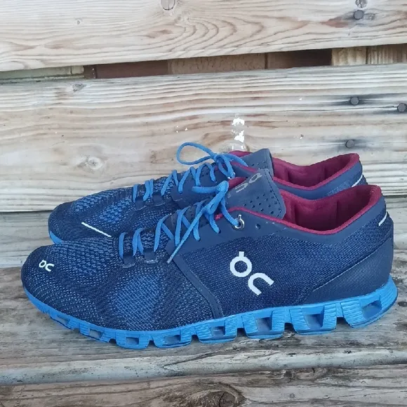 On Running Blue and Red Athletic Shoes with CloudTec Sole
