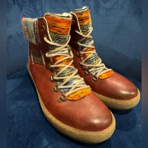 Rieker Felicitas Wine Colored Sherpa Lined Hiking Boot. Side zip &amp; lace-up.