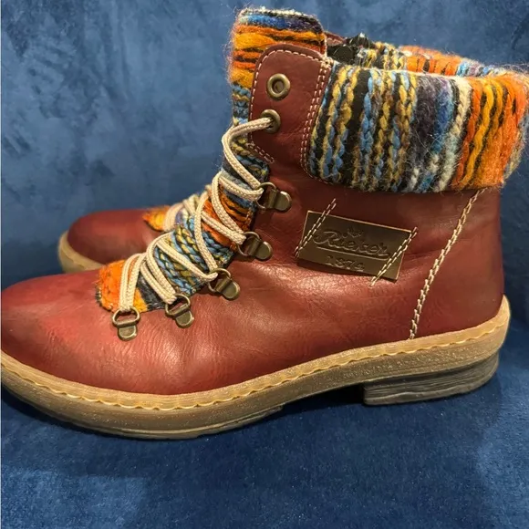 Rieker Felicitas Wine Colored Sherpa Lined Hiking Boot. Side zip &amp; lace-up.