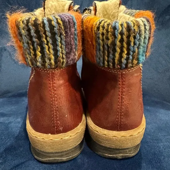 Rieker Felicitas Wine Colored Sherpa Lined Hiking Boot. Side zip &amp; lace-up.