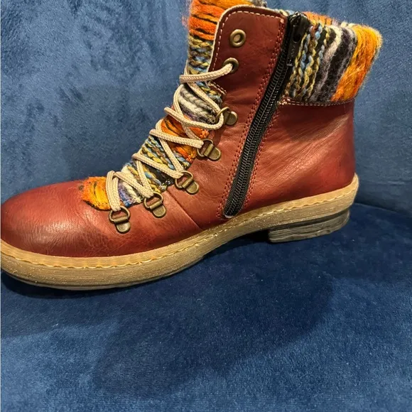 Rieker Felicitas Wine Colored Sherpa Lined Hiking Boot. Side zip &amp; lace-up.