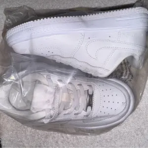 White Leather Sneakers with Perforated Design and Chunky Sole