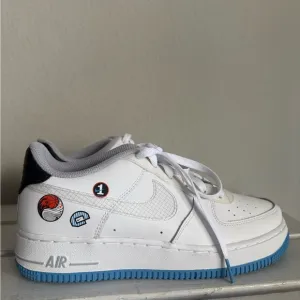 White Sneakers with Blue Sole and Graphic Details ONLY WORE ONCE
