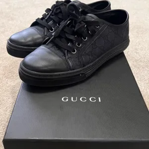 Women’s Gucci Black Sneakers